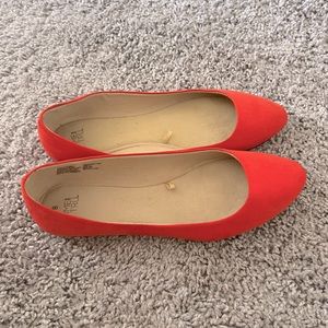 Red faux suede flats